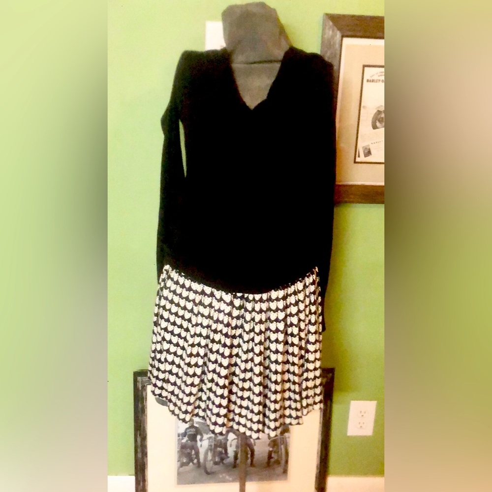 Very cute strawberry skirt. Elastic waste. Black and Cream color. Med-lg